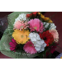 Spring Gerbera Bouquet. An arrangement by KW Flowers.