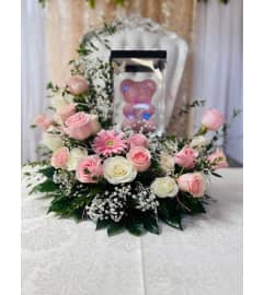 BLUSHING TEDDY. An arrangement by Dream Decorations Florist.