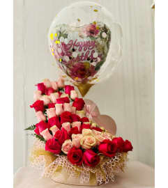 BLOSSOM BLAST BASKET. An arrangement by Dream Decorations Florist.