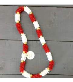 ribbon lei #49. An arrangement by Royal Louis Florist.