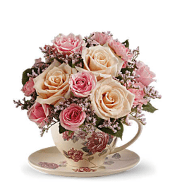 stylish tea cup. An arrangement by Fine's Flowers.