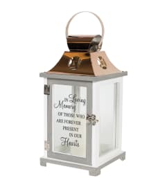 IN OUR HEARTS LANTERN. An arrangement by J.D. Ballantine's Flowers and Gifts.