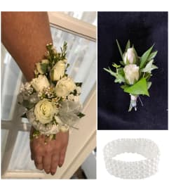 Follow Your Dreams- Roses Corsage and Boutonniere Pair. An arrangement by Loyalist Flowers. Follow Your Dreams- Roses Corsage and Boutonniere Pair. An arrangement by Loyalist Flowers.