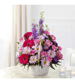 Soft Memories Basket. An arrangement by Geni's Florist and Gifts.