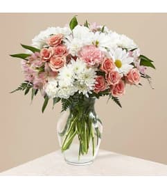 Blush by You. An arrangement by Geni's Florist and Gifts.