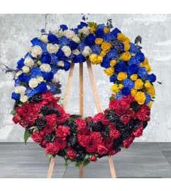 Dodger, Ram and Pilot Wreath. An arrangement by Massey's House of Flowers.