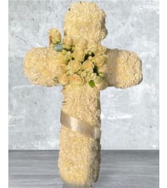 All white Simple Cross. An arrangement by Massey's House of Flowers.