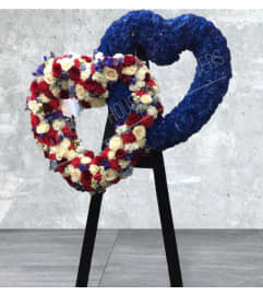 Double Open Heart Mixed In Front Solid in Back. An arrangement by Massey's House of Flowers.