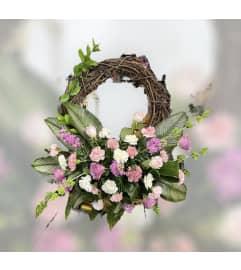 Grapevine Pink wreath. An arrangement by Massey's House of Flowers.