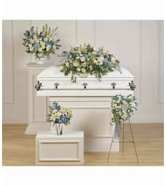 coleccion rembrance by connys. An arrangement by Conny's Flower Shop.
