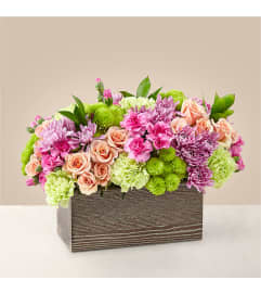SIMPLE CHARM BOUQUET FTD. An arrangement by Flowers of Jacksonville.