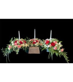 Urn Surround Arrangements. An arrangement by Avenue Florist.