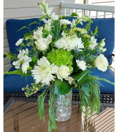 Forever You Will Be In Our Hearts. An arrangement by Loyalist Flowers.