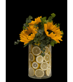 Marivel's Freshly Squeezed. An arrangement by Marivel's Florist and Gifts.