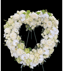 Marivel's Distinctive Opulent Heart. An arrangement by Marivel's Florist and Gifts.