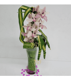 Elegant Cymbidium Touch. An arrangement by Brickell Exclusive Blooms.