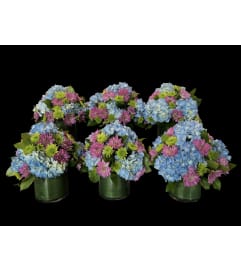 EVENT CENTERPIECES. An arrangement by Hours of Flowers.
