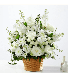 Condolences Arrangement. An arrangement by Garden Florist.