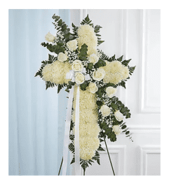 Peace and Prayers™ Standing Cross- White Roses. An arrangement by Garden Florist.