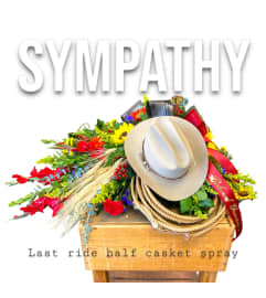 RUSTIC Last Ride Casket spray. An arrangement by Rustic Floral and Gifts.