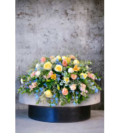 RUSTIC Ocean sunset. An arrangement by Rustic Floral and Gifts.