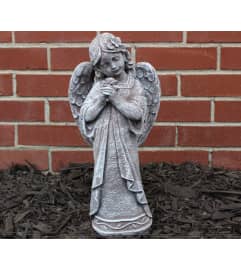 Rose Angel Statue. An arrangement by Sueppel's Flowers.