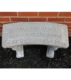 Amazing Grace Stone Memorial Bench. An arrangement by Sueppel's Flowers. Amazing Grace Stone Memorial Bench. An arrangement by Sueppel's Flowers.