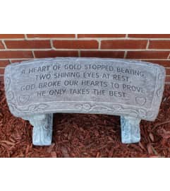 A Heart of Gold Stone Memorial Bench. An arrangement by Sueppel's Flowers. A Heart of Gold Stone Memorial Bench. An arrangement by Sueppel's Flowers.