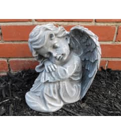 Small Sleeping Angel. An arrangement by North Liberty Flower Shop. Small Sleeping Angel. An arrangement by North Liberty Flower Shop.