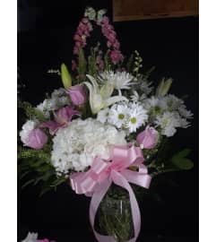 PINK SOMMERFUL. An arrangement by Howard Beach Florist. PINK SOMMERFUL. An arrangement by Howard Beach Florist.
