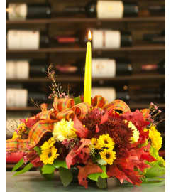 SINGLE CENTERPIECE. An arrangement by Conny's Flower Shop.