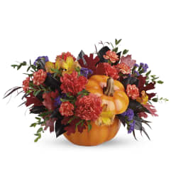 The Teleflora Hauntingly Pretty Pumpkin. An arrangement by Fendley Florists.
