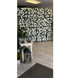 Flower Wall rental with refundable security deposit of $250.00 is. An arrangement by Floral Classics.