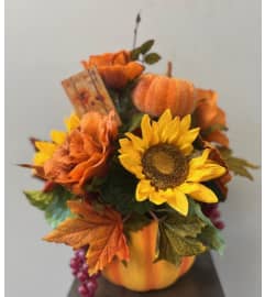 SILK FLORAL FALL ARRANGEMENT. An arrangement by Marianna's Flower Island.