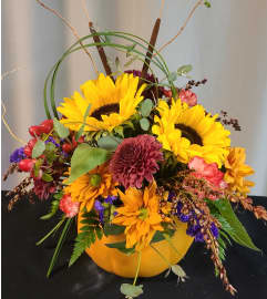A Colorful Thanksgiving. An arrangement by Harriet's Flower and Gift Shop.