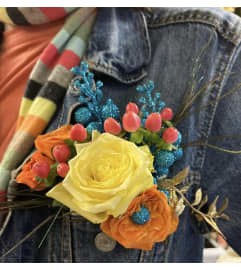 Pocket Flair Flowers for Homecoming , Prom, and Weddings / Boutonni. An arrangement by Flowers by Priscilla.