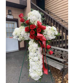Blessings Cross. An arrangement by Violeta's Flower Shop.