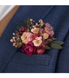 Simple Pocket Square Flair / Boutonniere. An arrangement by Flowers by Priscilla.