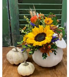 White Ceramic Pumpkin Autumn Arrangement. An arrangement by Forest Florist. White Ceramic Pumpkin Autumn Arrangement. An arrangement by Forest Florist.