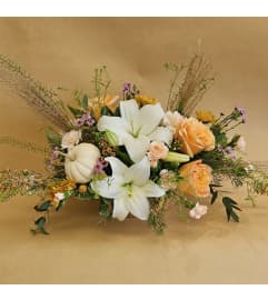 Autumn Basket with lilies. An arrangement by Flower Trends Florists.