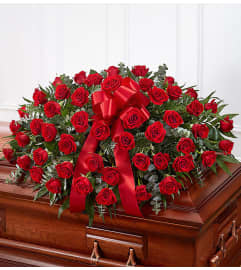 Garden Casket Spray All Red Roses. An arrangement by Garden Florist.