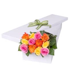 Dozen Elegant Mixed Roses in Box. An arrangement by KW Flowers.