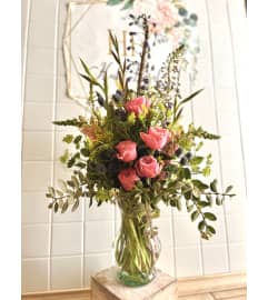 A Garden Rose. An arrangement by Huf Floral.