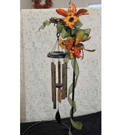 Seasonal Sympathy Windchime. An arrangement by Dupree's Root 88 Garden Center and Florist.