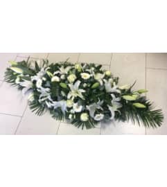 White Casket Spray 2023. An arrangement by Northwest Florist.