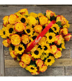 Warmth of the Heart Spray. An arrangement by The Farm and Floral Market.