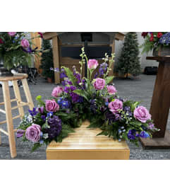 Purple Passion Half Urn Wreath. An arrangement by The Farm and Floral Market.