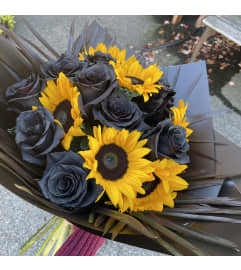 Halloween Bouquet. An arrangement by Violeta's Flower Shop.