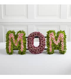 Mom's. An arrangement by Garden Florist.