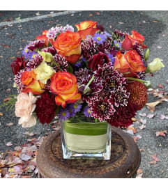 Sunrise Floral Arrangement. An arrangement by Violeta's Flower Shop.